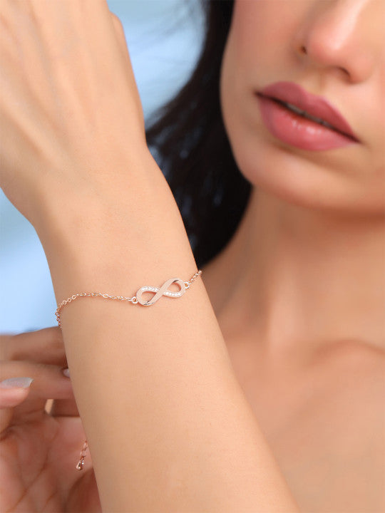 Women White Gold Toned Infinity Shape Crystal Studded Charming Bracelet