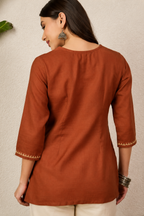 Women's Rust Embroidered Round Neck Fusion Wear Cotton Short Kurti