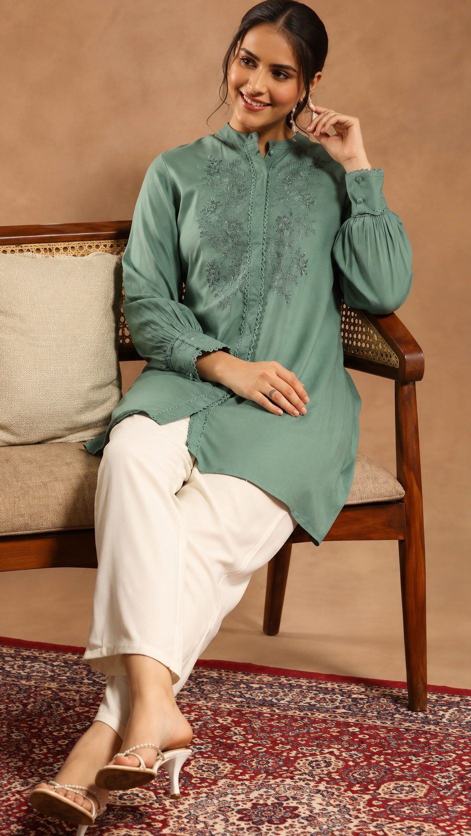 Women Solid Embroidered A-line Viscose Rayon Tunic