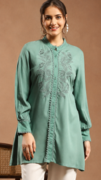 Women Solid Embroidered A-line Viscose Rayon Tunic