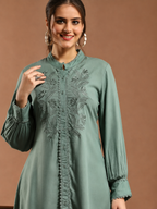 Women Solid Embroidered A-line Viscose Rayon Tunic