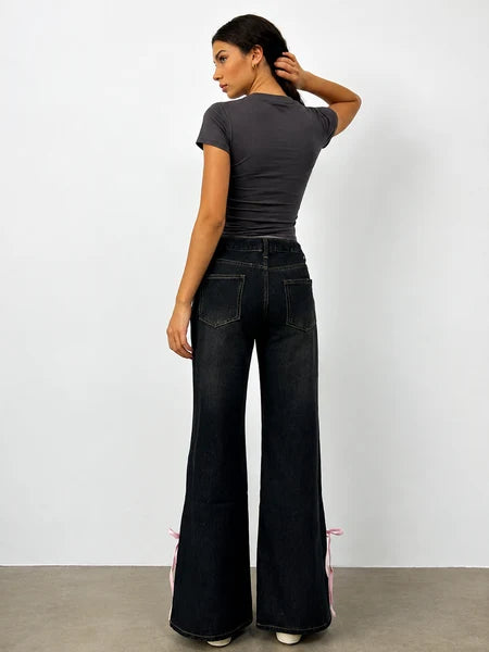 Una Bow Slit High Rise Bootcut Jeans